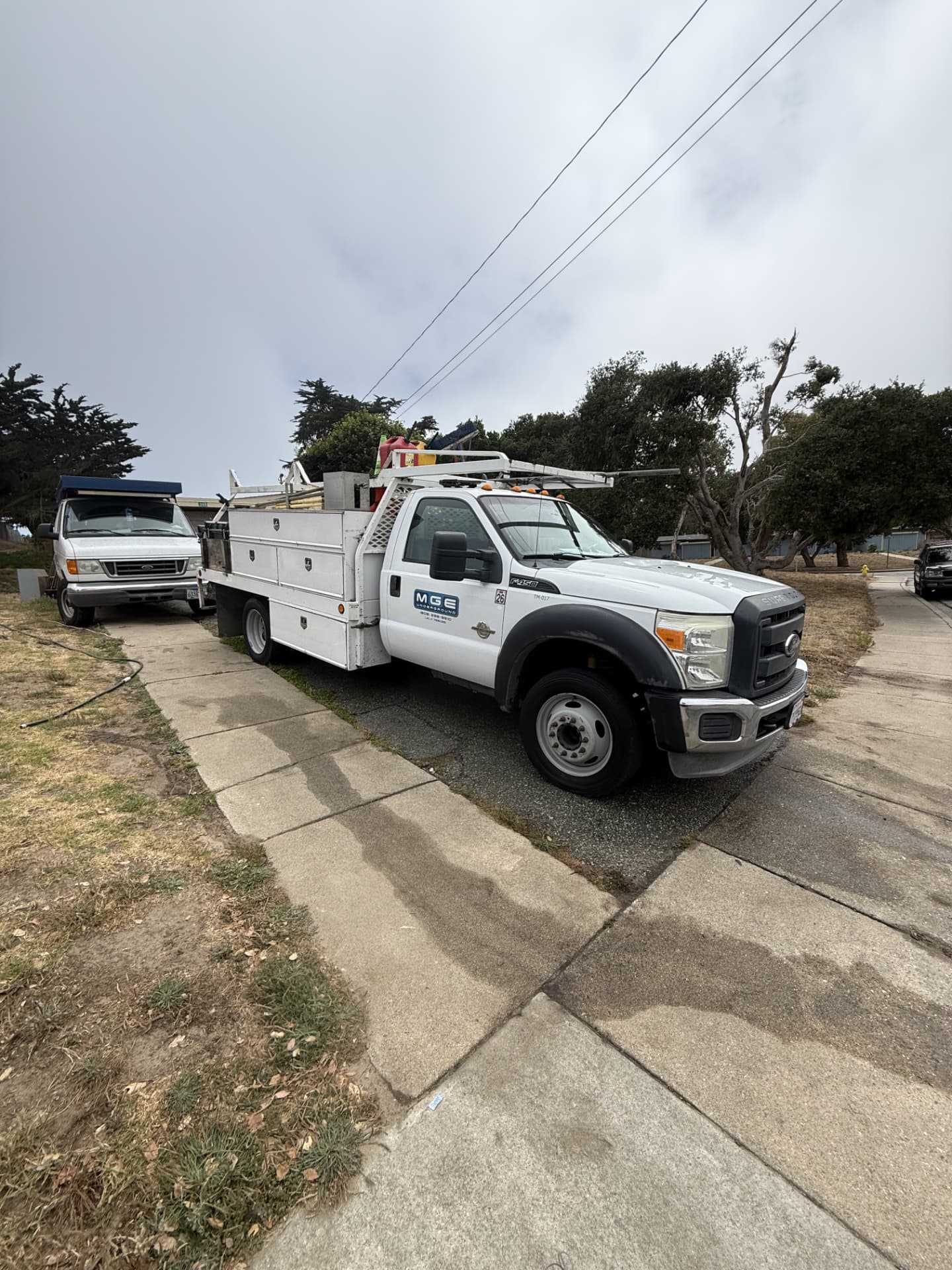 White Ford utility service truck after mobile fleet detailing in Monterey County